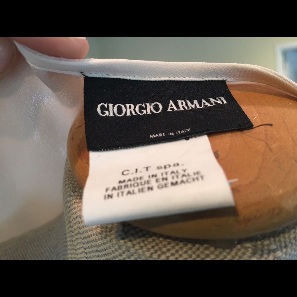 Cream colored Giorgio Armani  blouse.
